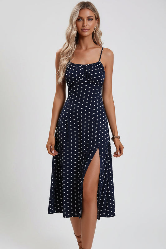 Black polka dot print sleeveless split maxi dress with flowing silhouette