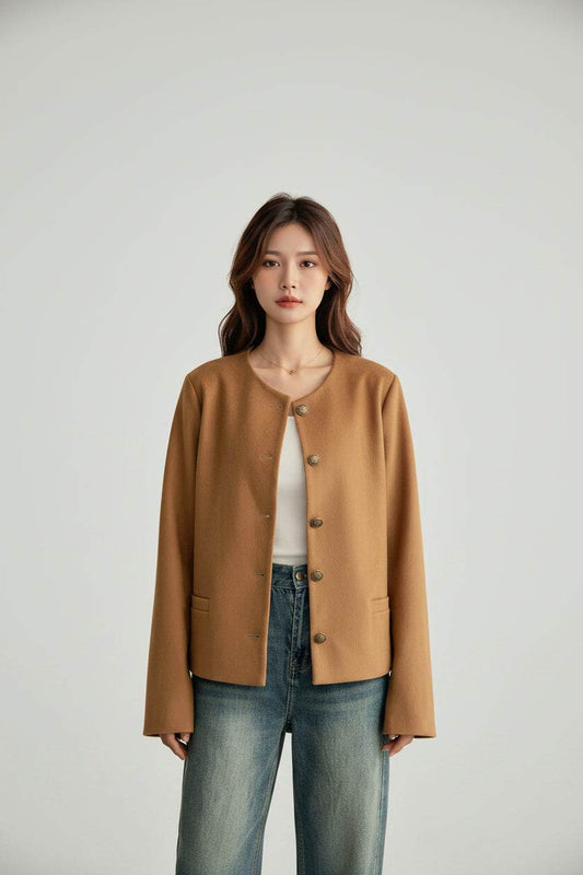 Soft faux suede coat with long sleeves and relaxed silhouette for easy seasonal layering in neutral tones