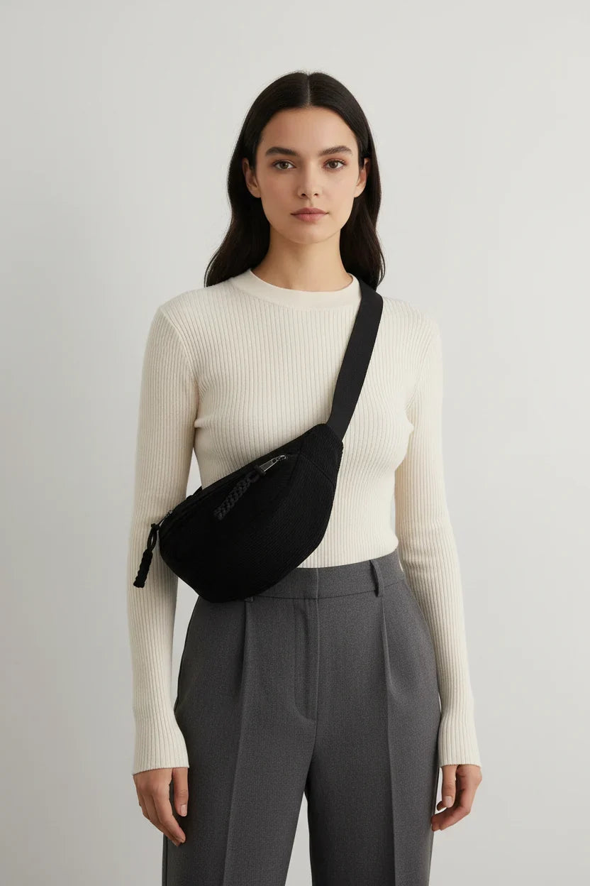 Casual corduroy belt bag with soft textured crescent design and adjustable strap for everyday wear