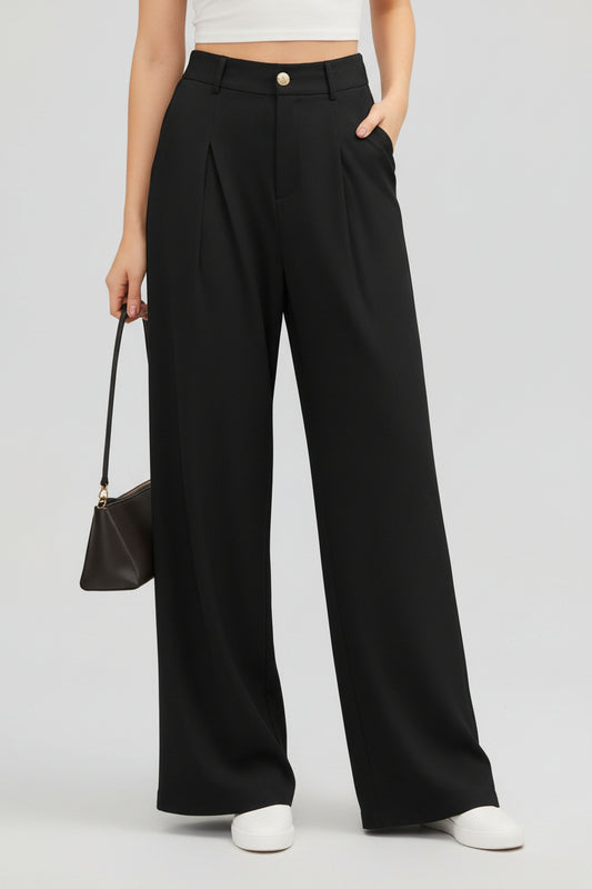 Model wearing black wide-leg pants