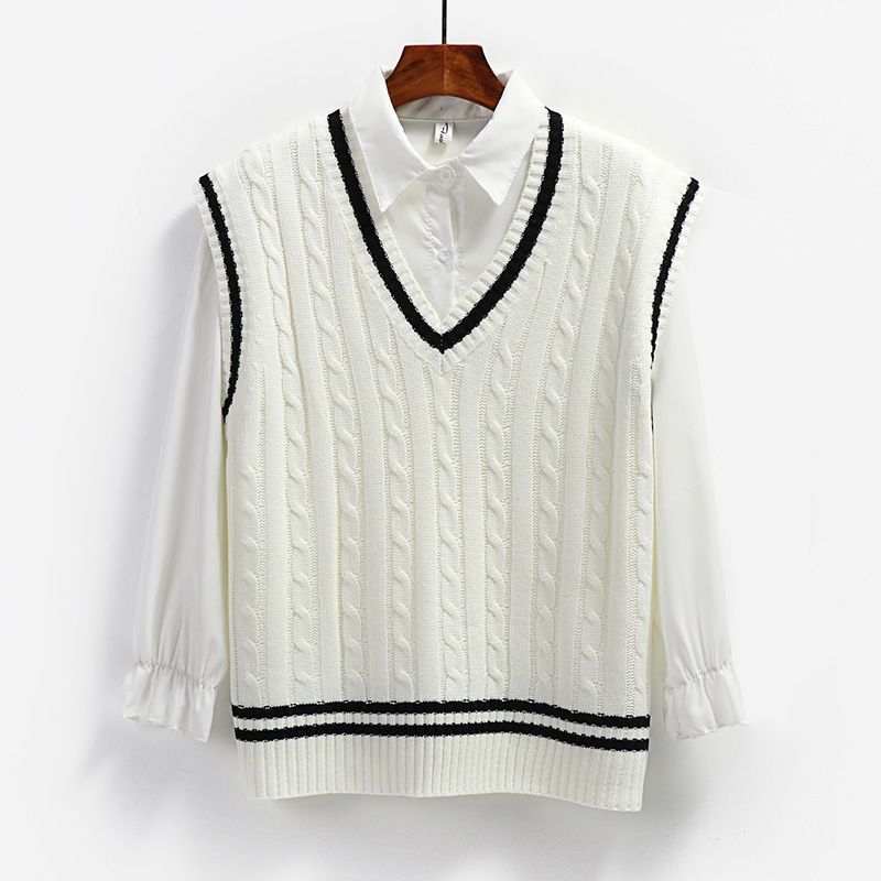 Women's cream cable-knit sweater vest with black contrast trim