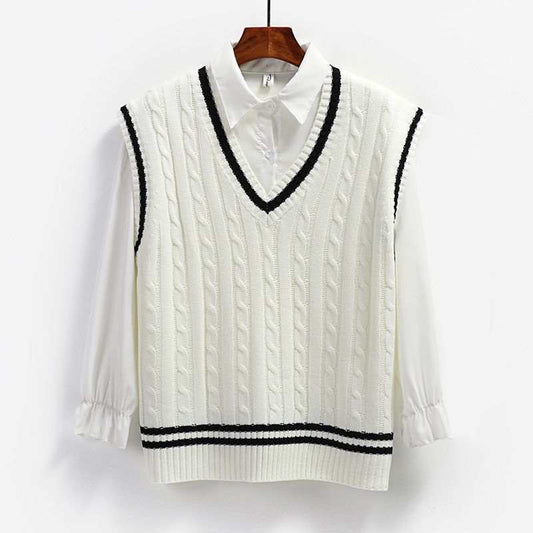 Women's cream cable-knit sweater vest with black contrast trim